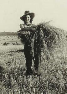 Theresa in a wheat field in Nebraska.